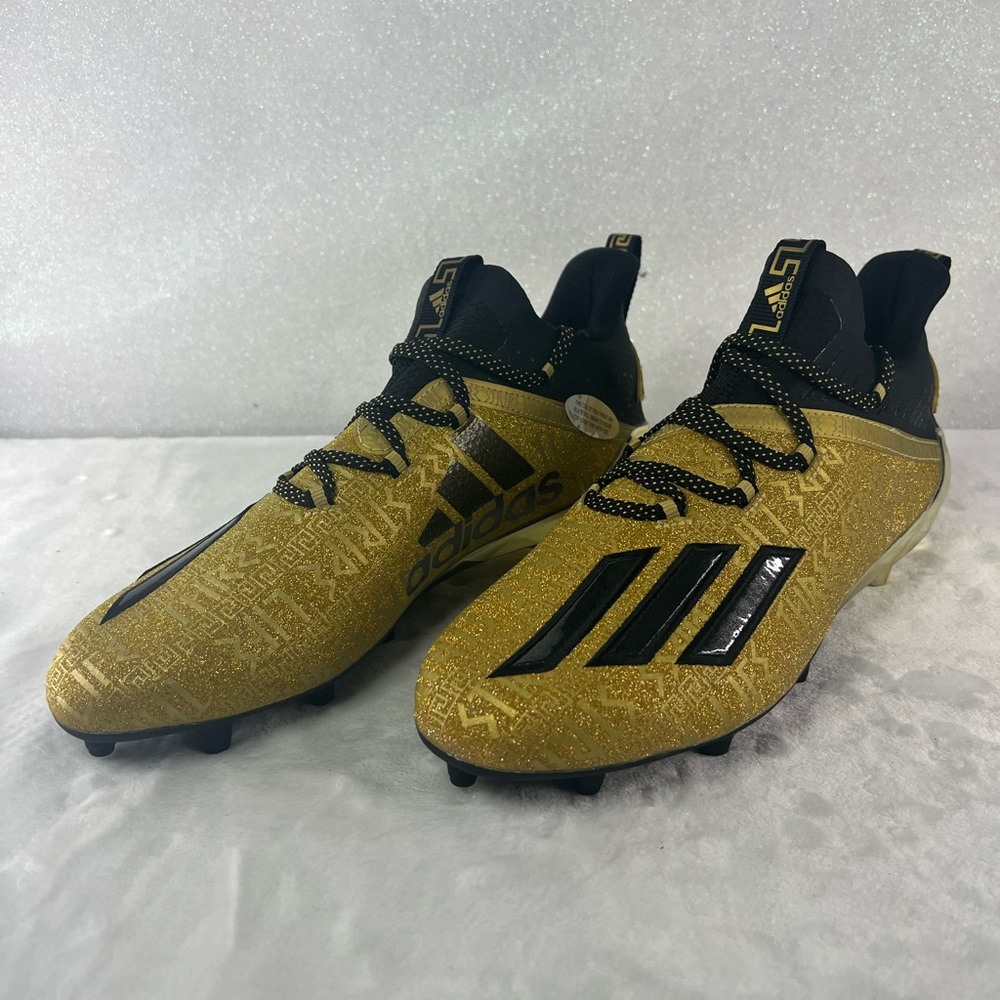 Gold and black adidas football cleats size 9 1/2